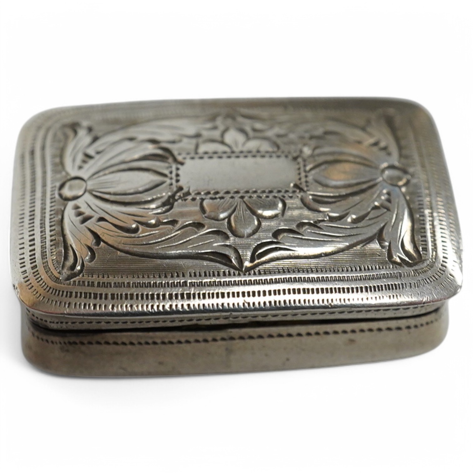 A George IV engraved silver rectangular vinaigrette, Joseph Wilmore, Birmingham, 1829, 26mm. Condition - fair to good